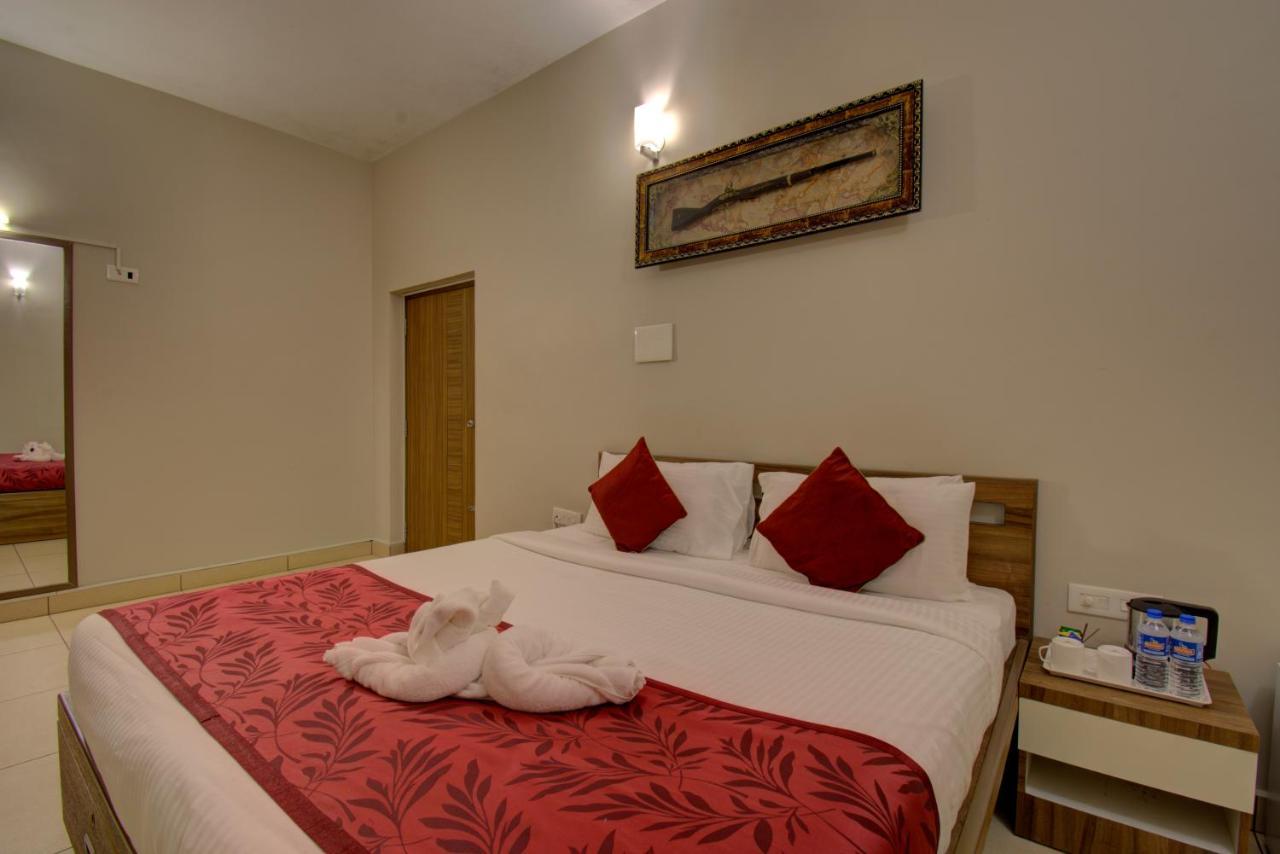 วู้ดสต็อค รีสอร์ต Hotel มาดิเครี ภายนอก รูปภาพ