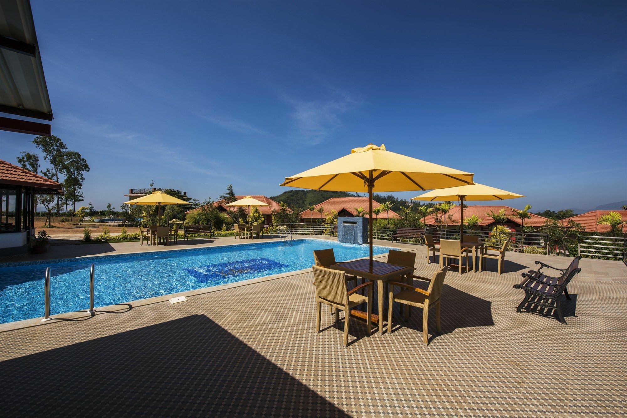 วู้ดสต็อค รีสอร์ต Hotel มาดิเครี ภายนอก รูปภาพ